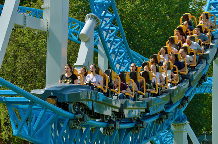 Saint-Petersburg.Russia. July.15.2018. Kresovsky island.Divo island Park.A popular attraction is the Russian roller coaster.It is a railway system of special design.Passengers traveling in railcar at high speed.のeditorial素材