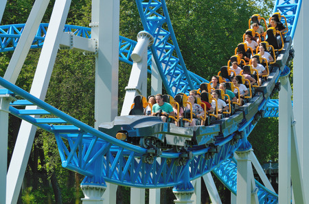 Saint-Petersburg.Russia. July.15.2018. Kresovsky island.Divo island Park.A popular attraction is the Russian roller coaster.It is a railway system of special design.Passengers traveling in railcar at high speed.のeditorial素材