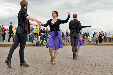 Saint-Petersburg.Russia.July 13.2019.Dancing in the town square in the fresh air.Anyone who wants to dance to music can take part.This is ballroom dancing Rumba, Tango, Salsa, Cha Cha, Samba.のeditorial素材