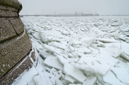 It's a cold and frosty winter.The Bay is covered with ice.の写真素材
