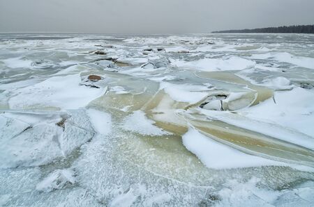 It's a cold and frosty winter.The Bay is covered with ice.の写真素材