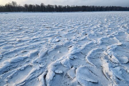 It's a cold and frosty winter.The Bay is covered with ice.の写真素材