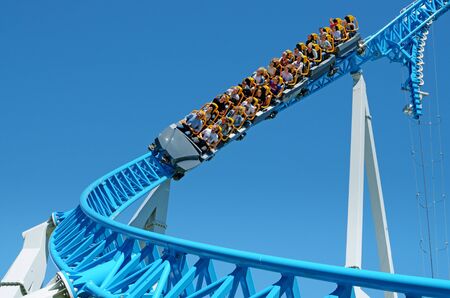 Saint-Petersburg.Russia.June 23.2019. Kresovsky island.Divo island Park.A popular attraction is the Russian roller coaster.It is a railway system of special design.Passengers traveling in railcar at high speed.の写真素材