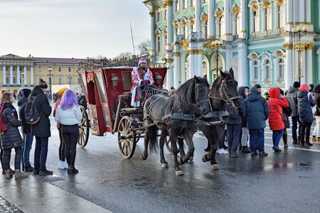 St. Petersburg. Russia. January 02.2020.Palace Square.Horse carriage tour in the city center.Guests...