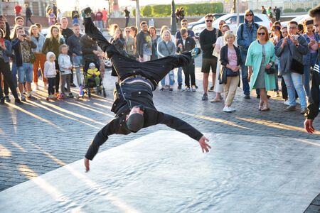 St. Petersburg. Russia. June 20.2020.The guys are dancing break dance on the street.They gather...