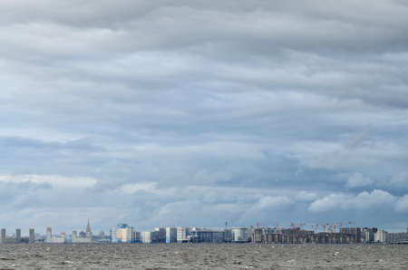 Dark storm clouds over the sea. The rain will start soon.の写真素材