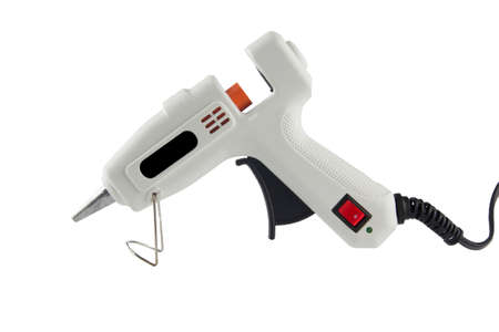 hot adhesive gun isolated on white の写真素材