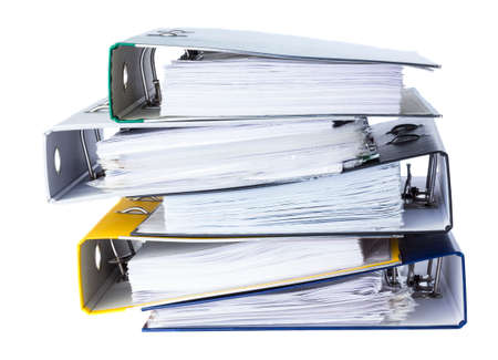 folders in a stack of documents for accounting and isolated on a white background.の写真素材
