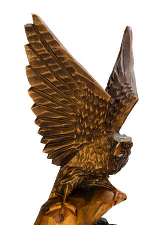 Eagle on white background isolated wood carvedの写真素材