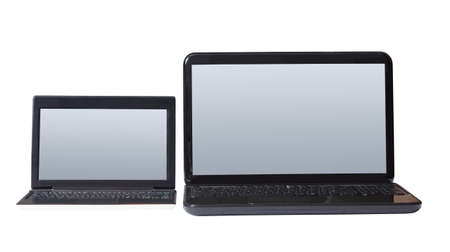 Computer isolated on white background with a netbook keyboard and display for personal use.の写真素材