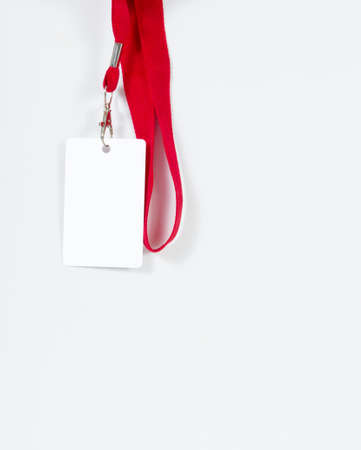 Badge with a place for text on a red lace and a gray background.の写真素材