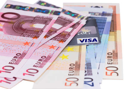 Credit card and money isolated on white backgroundのeditorial素材