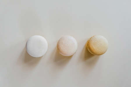 Color macarons on the background, in the shape of buttons.の写真素材