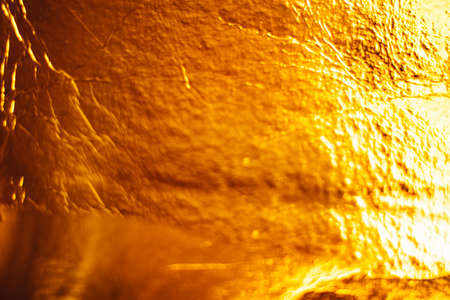 Holiday gold background. Flat lay, top view, copy space.の写真素材