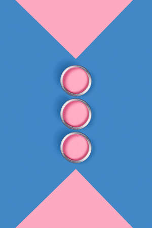 Repare concept. Blue and pink background with pink paint jars and corners. Flat lay, top view, copy...