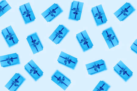 Pattern with classic blue bow on boxes. Christmas pattern.の写真素材