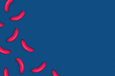 Food pattern of painted pink bananas on classic blue background.の写真素材