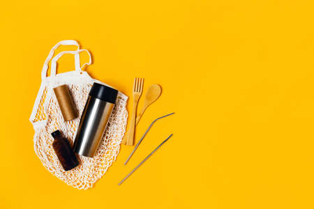 Plastic free concept. Set of eco friendly cutlery for picnic. Flat lay, top view, copy space.の写真素材