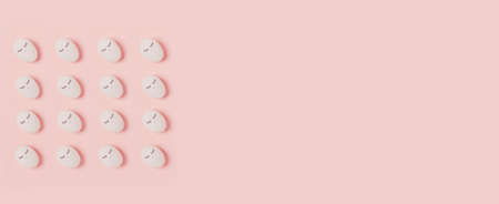 Happy Easter. Web banner with white eggs with painted eyes on pink background. Flat lay, top view,...