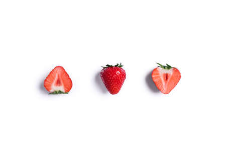Sweet summer strawberries on an isolated white background.