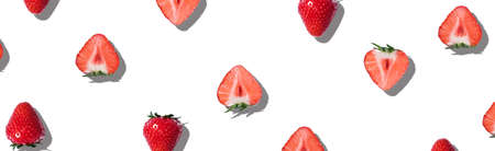 Sweet summer strawberries on an isolated white background.の写真素材