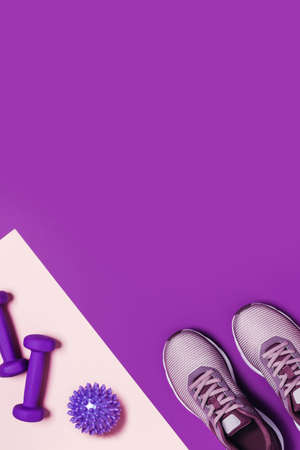 Sports equipment for training at home. Pink-purple background, diagonal composition.