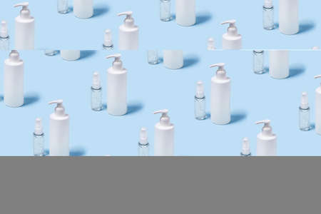 Front view with a bottles of antiseptic soap and a hand sanitizer.の写真素材