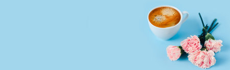 Web banner with morning cup of strong coffee with flowers on blue background.