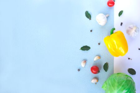 fresh bright local vegetables on a blue background. flat lay.の写真素材