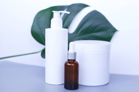 The concept of zero waste. different luxe cosmetics on white and grey backgroundの写真素材
