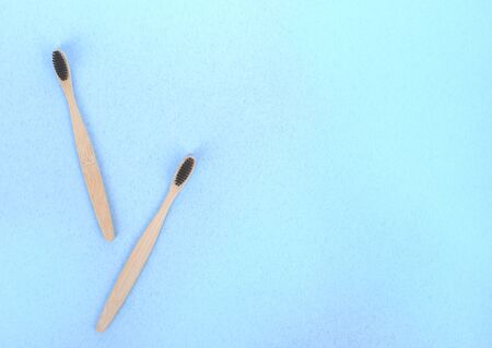 zero waste concept. bamboo toothbrushes on a white-blue background.の写真素材