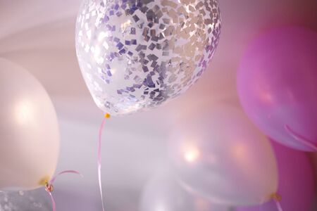 pink, white and silver balloons. best background for your design.