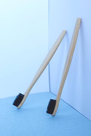 zero waste concept. bamboo toothbrushes on a white-blue background.の写真素材