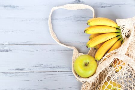 Package-free food shopping. Eco friendly natural bag with organic fruits. Zero waste concept.の写真素材