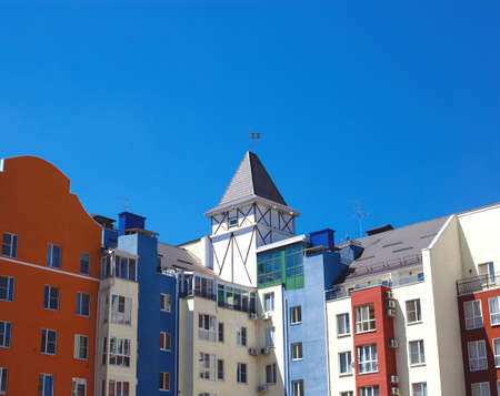 beautiful multicolored houses against the blue sky.の写真素材