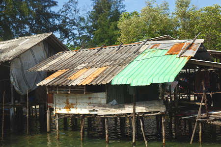 stilt house on the water in a Thai fishing village.の写真素材
