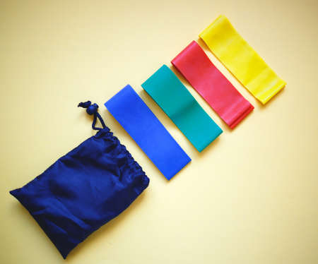 a set of bright fitness rubber bands for doing sports at home.の写真素材