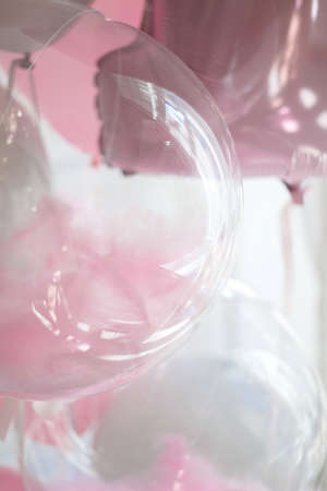 beautiful pink and transparent balloons. blur, selective focus.の写真素材