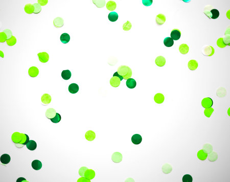 multicolored confetti on white background great background for design.の写真素材