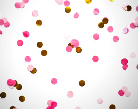 multicolored confetti on white background great background for design.の写真素材