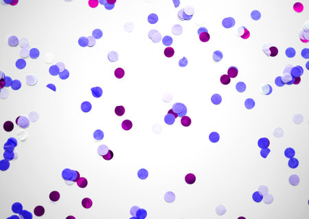 multicolored confetti on white background great background for design.の写真素材