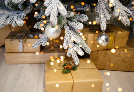 beautiful holiday crafts with gifts under the christmas tree.の写真素材