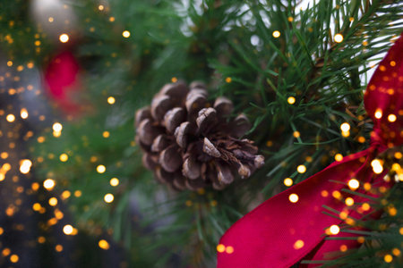 christmas decor. fir branches, cones, ribbons and christmas balls.の写真素材