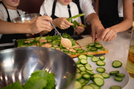 close-up shot. hands holding fresh chicken toast at cooking classesの写真素材