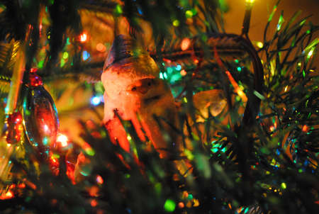 Christmas tree and soviet toy of Santa Claus in the centerの写真素材