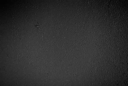 Old dark gray particleboard for background. Textureの写真素材