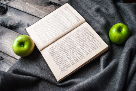 Pastime with reading a Russian book in autumnの写真素材