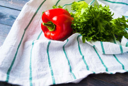 Red ripe bell pepper and letucce for cooking healthy saladの写真素材