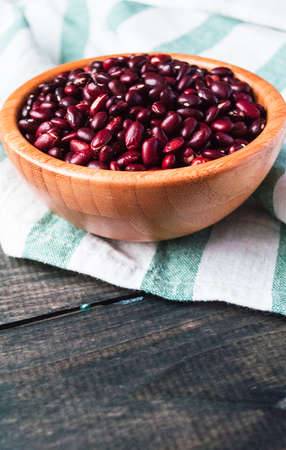 Dried red kidney beans in a bamboo bowl, copy spaceの写真素材