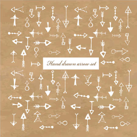 Perfect vintage  arrows. Hand drawn vector arrow collection isolated on brown paper background.のイラスト素材